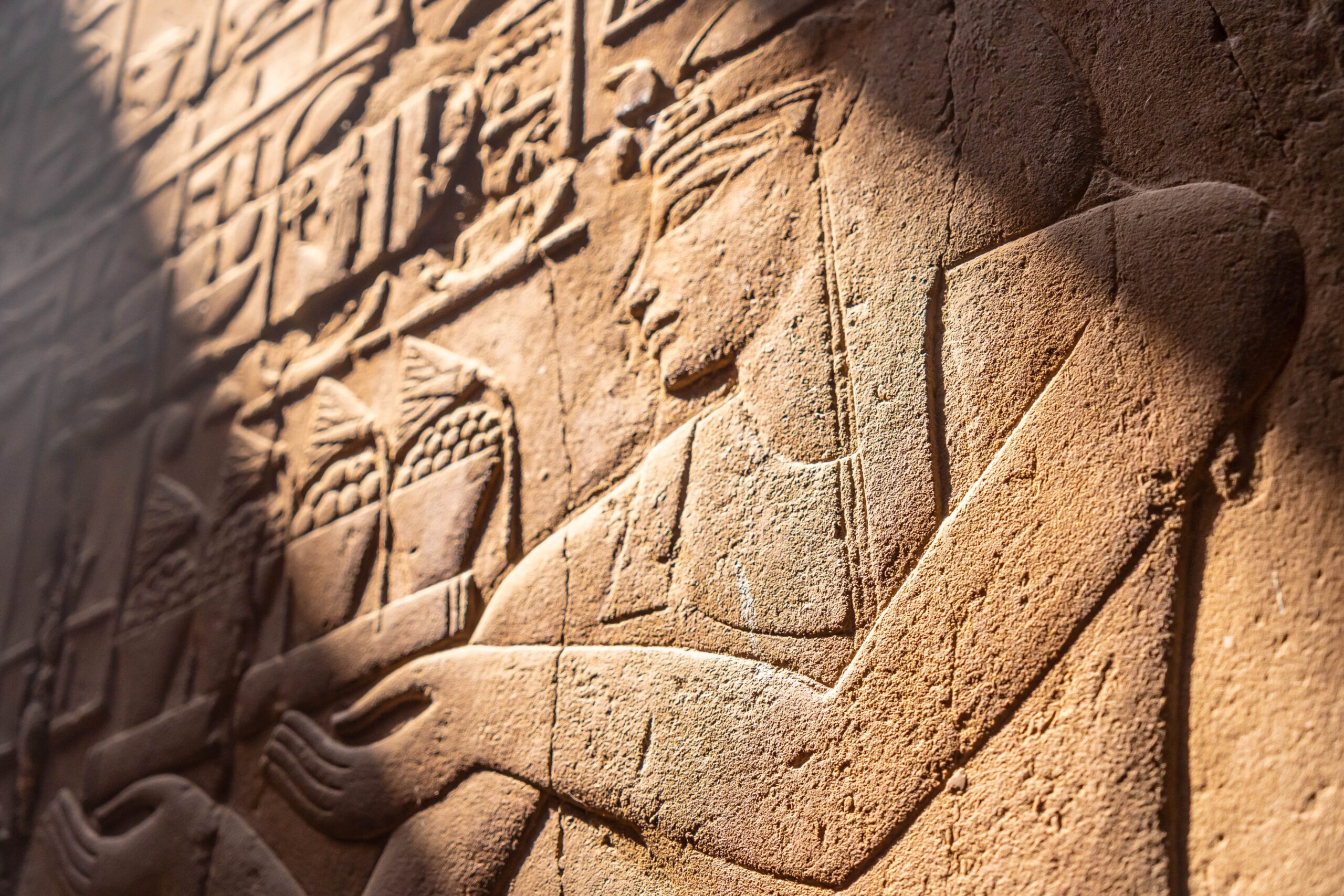closeup-engravings-walls-luxor-temple-egypt-min
